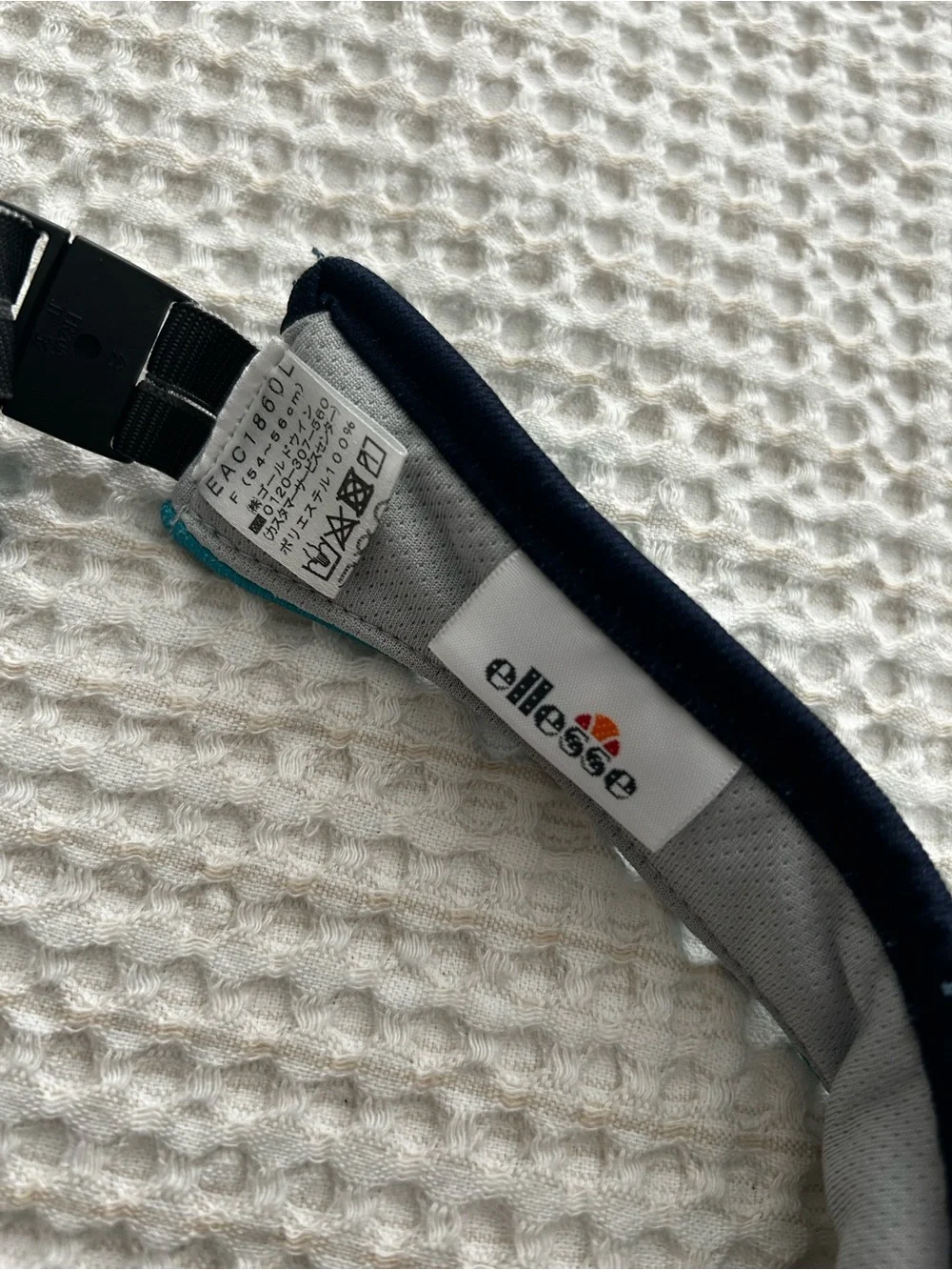 Ellesse Teal Visor with Navy & White Trim